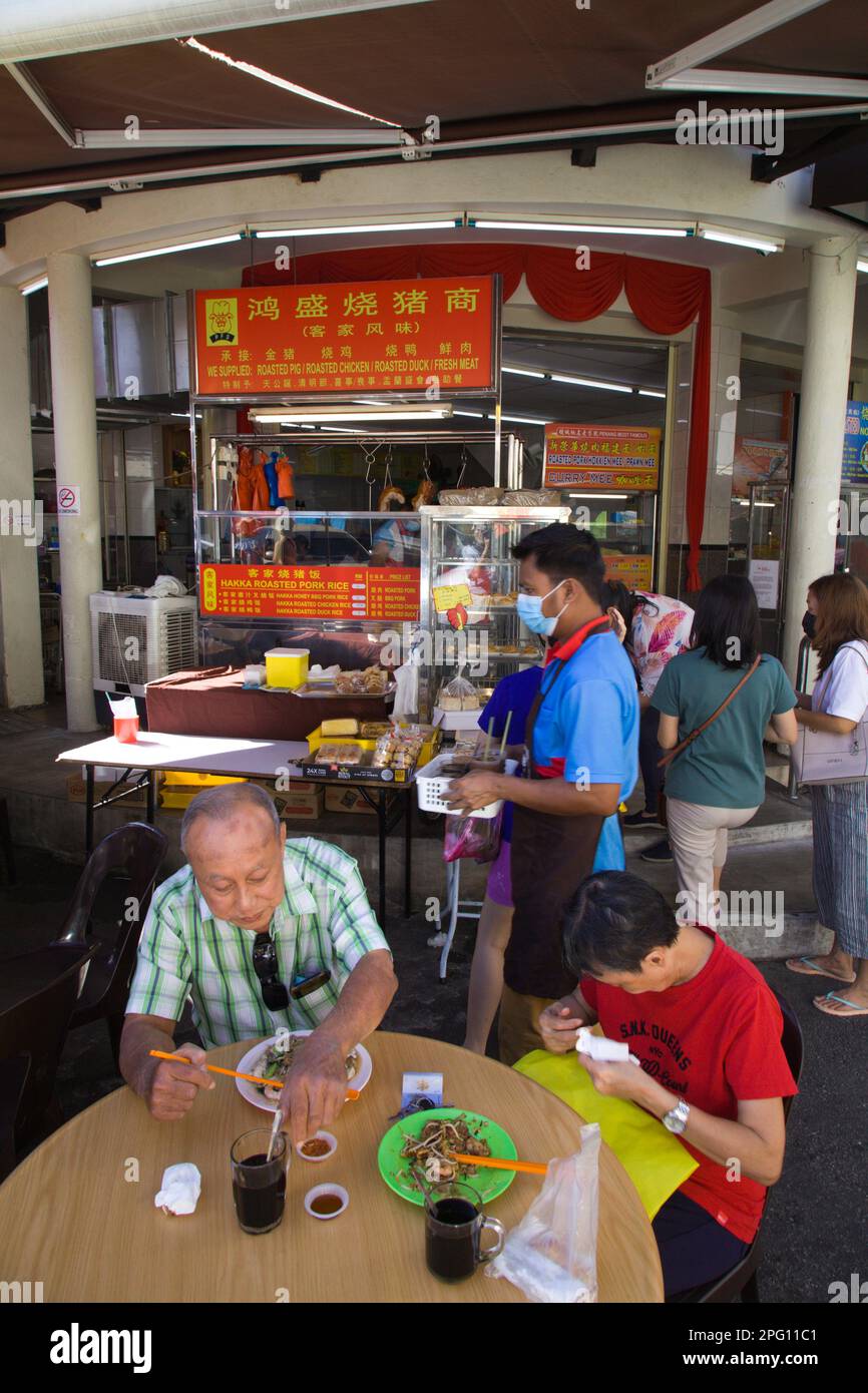 Malaysia, Penang, food court, people, eating Stock Photo