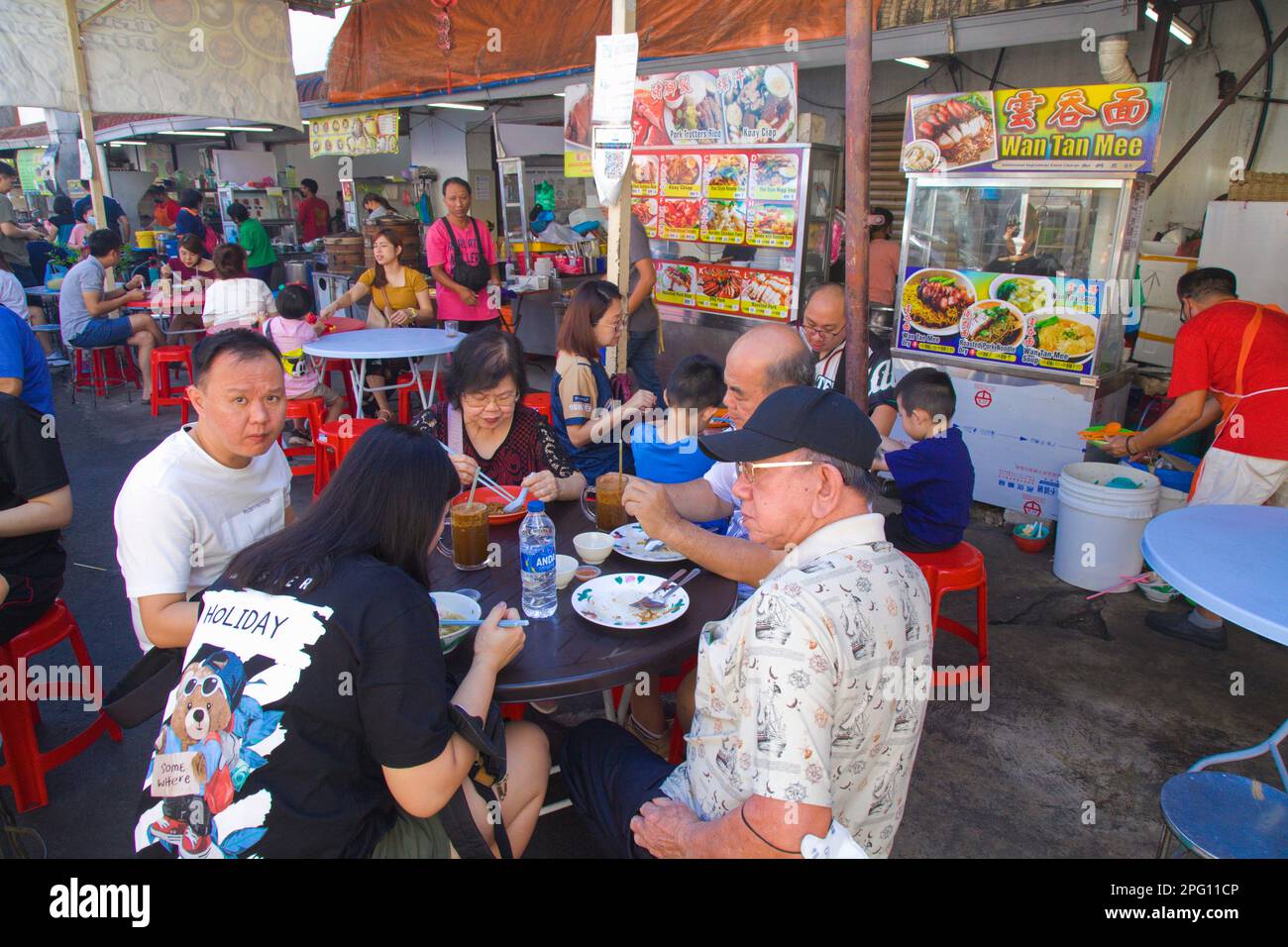 Malaysia, Penang, Georgetown, food court, people, eating Stock Photo