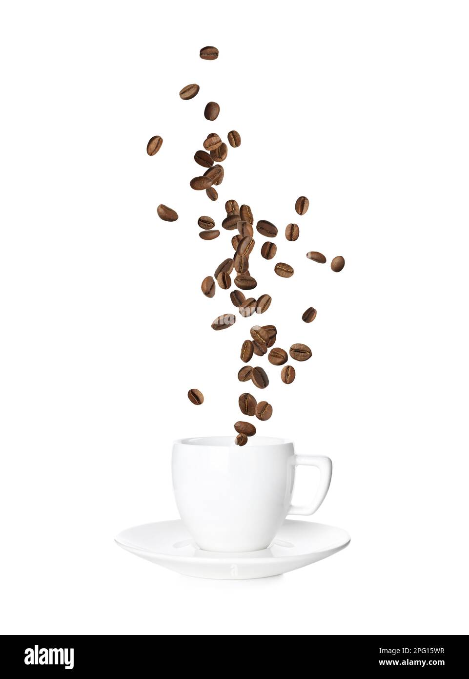 Aromatic roasted coffee beans falling into cup on white background ...