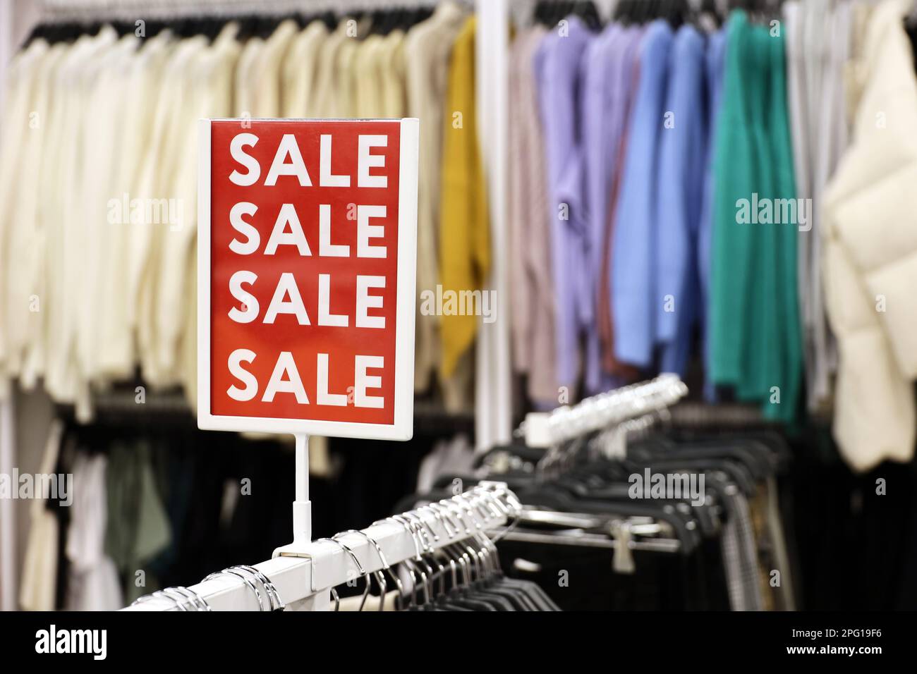 Sale signs with discounts in a clothing store. Concept of retail sales ...