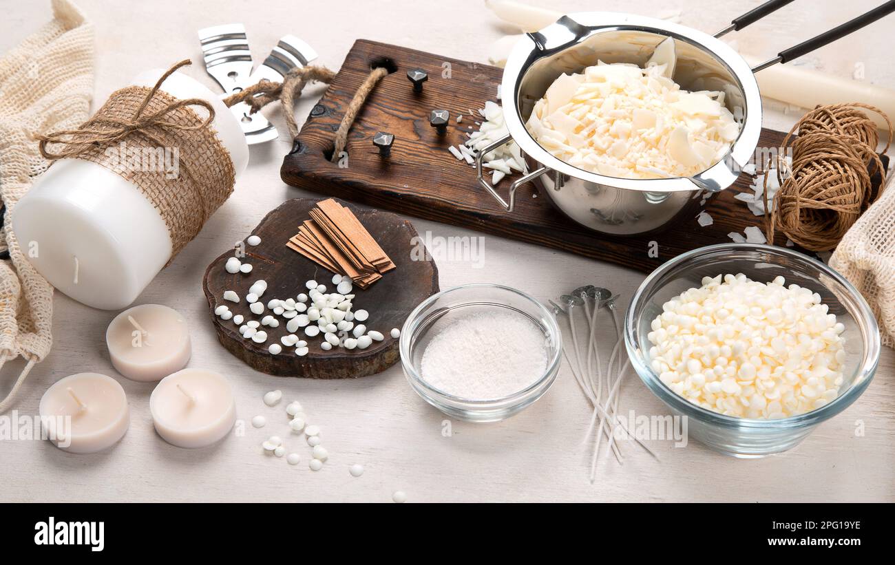 Set for homemade natural eco soy wax candles on white background. Making diy candles Stock Photo