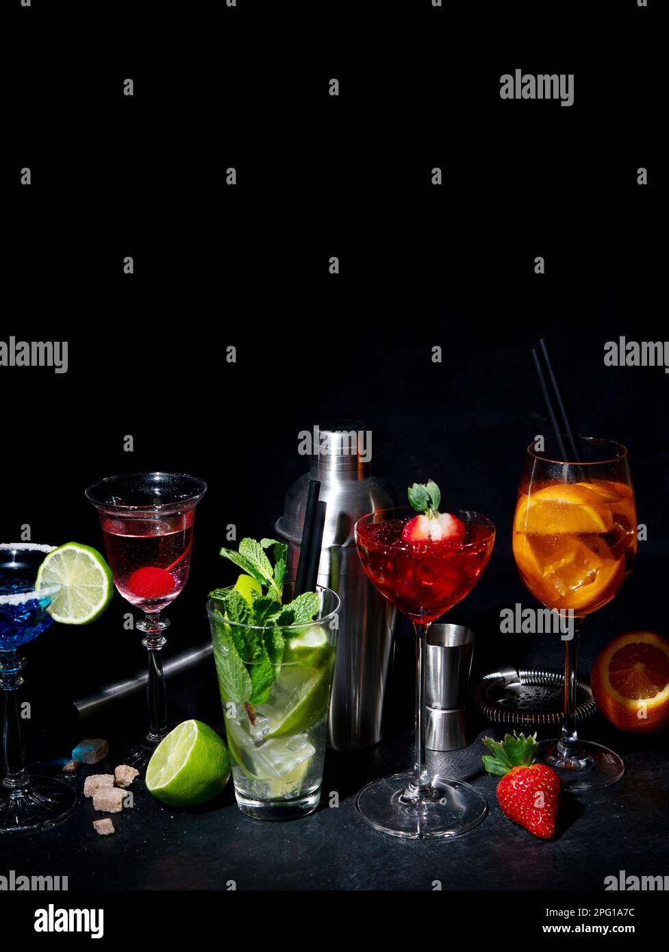 Set of various colorful cocktails on black background. Classic long drink cocktails menu concept. Copy, space Stock Photo