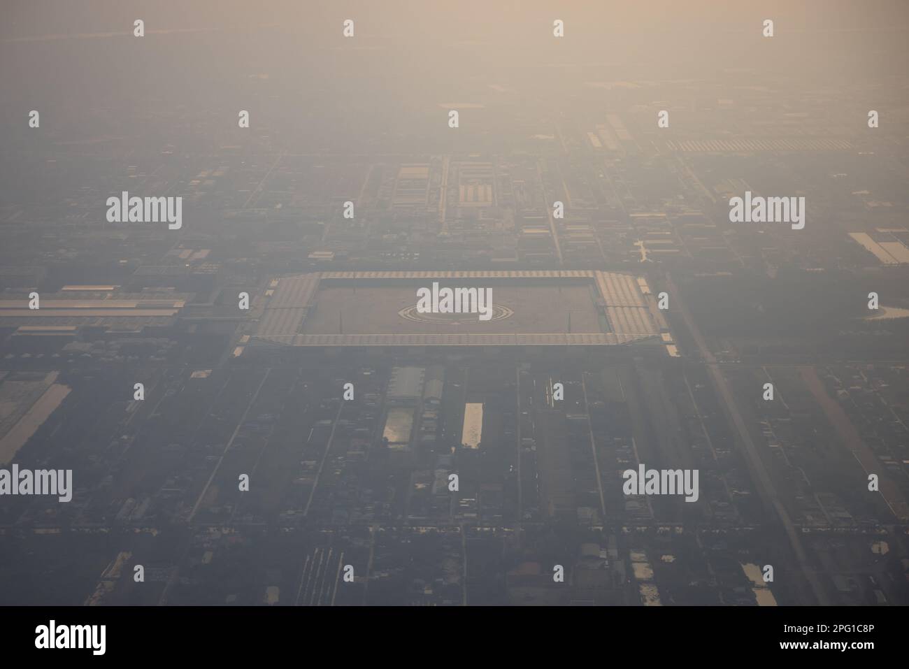 A aerial view of Wat Phra Dhammakaya Buddhist temple in Pathum Thani, north of Bangkok amid smog and air pollution in Thailand on March 18, 2023. Stock Photo