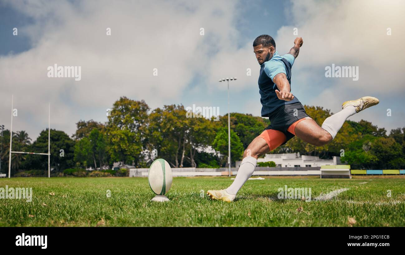 Rugby Action And Man Kicking Ball To Score Goal On Field At Game Rugby Action And Man Kicking Ball To Score Goal On Field At Game