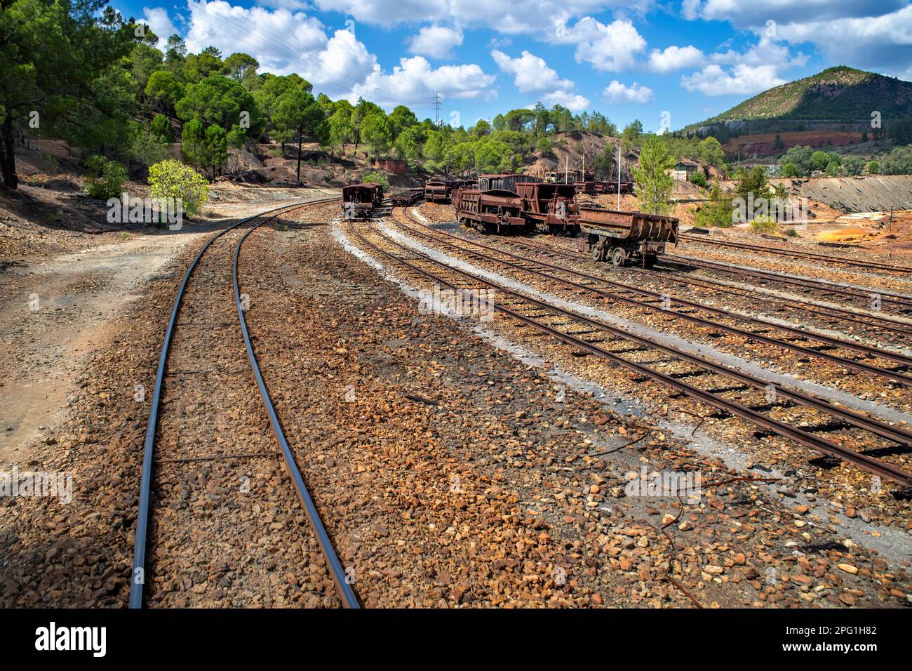 Old abandoned steam trains seen from the touristic train used for tourist trip through the RioTinto mining area, Huelva province, Spain.  The Rio Tint Stock Photo