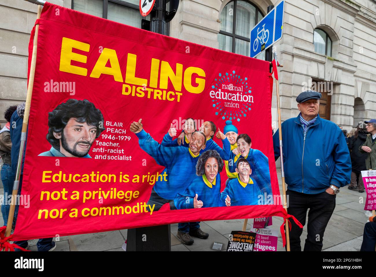 Protest taking place in London on UN Anti Racism Day. Stand up to Racism. Blair Peach quote on Ealing District National Education Union banner Stock Photo