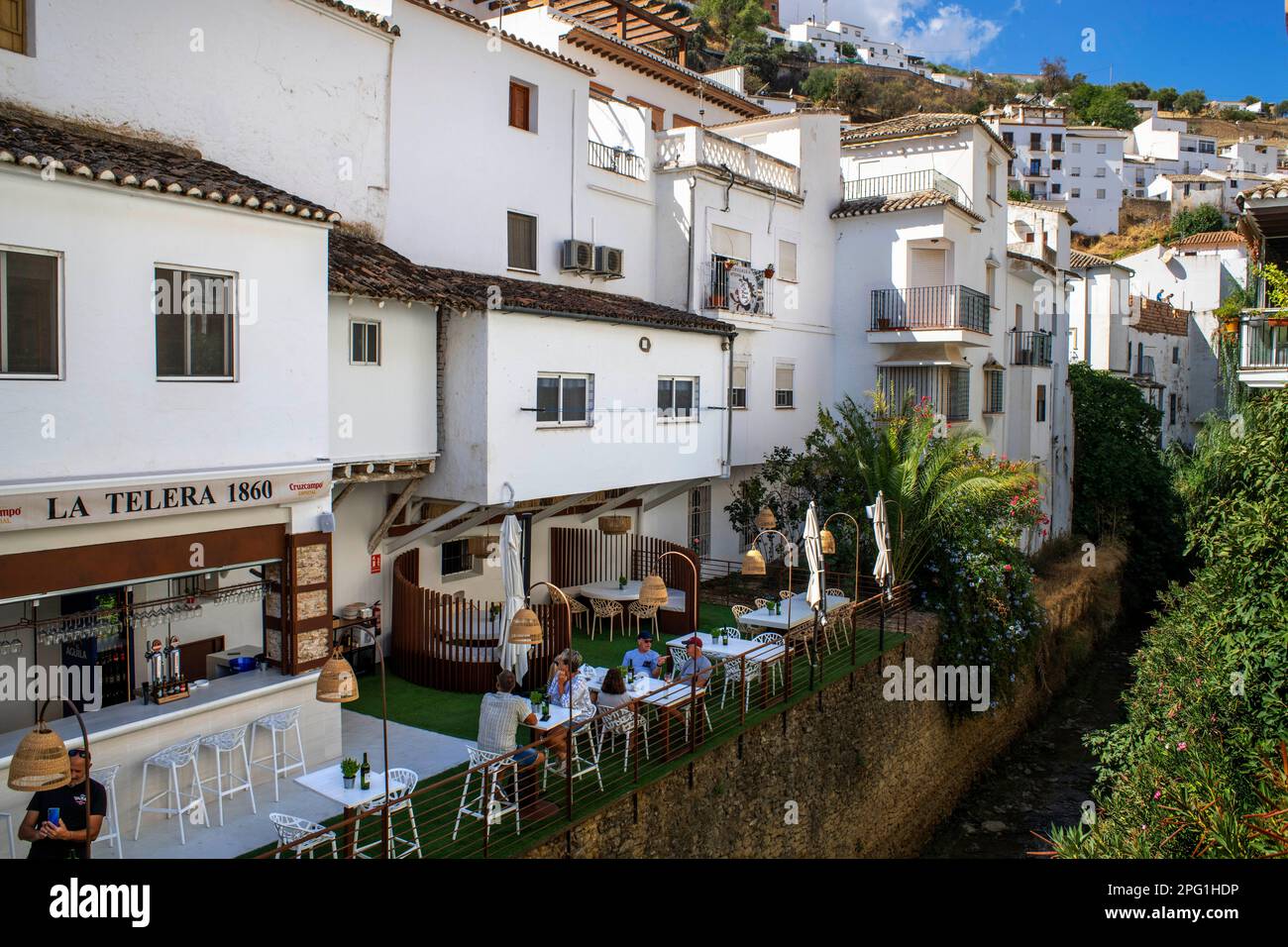 Bars and restaurants in Setenil de las Bodegas, Cadiz province, Spain.  Setenil de las Bodegas is a town pueblo and municipality in the province of Cá Stock Photo