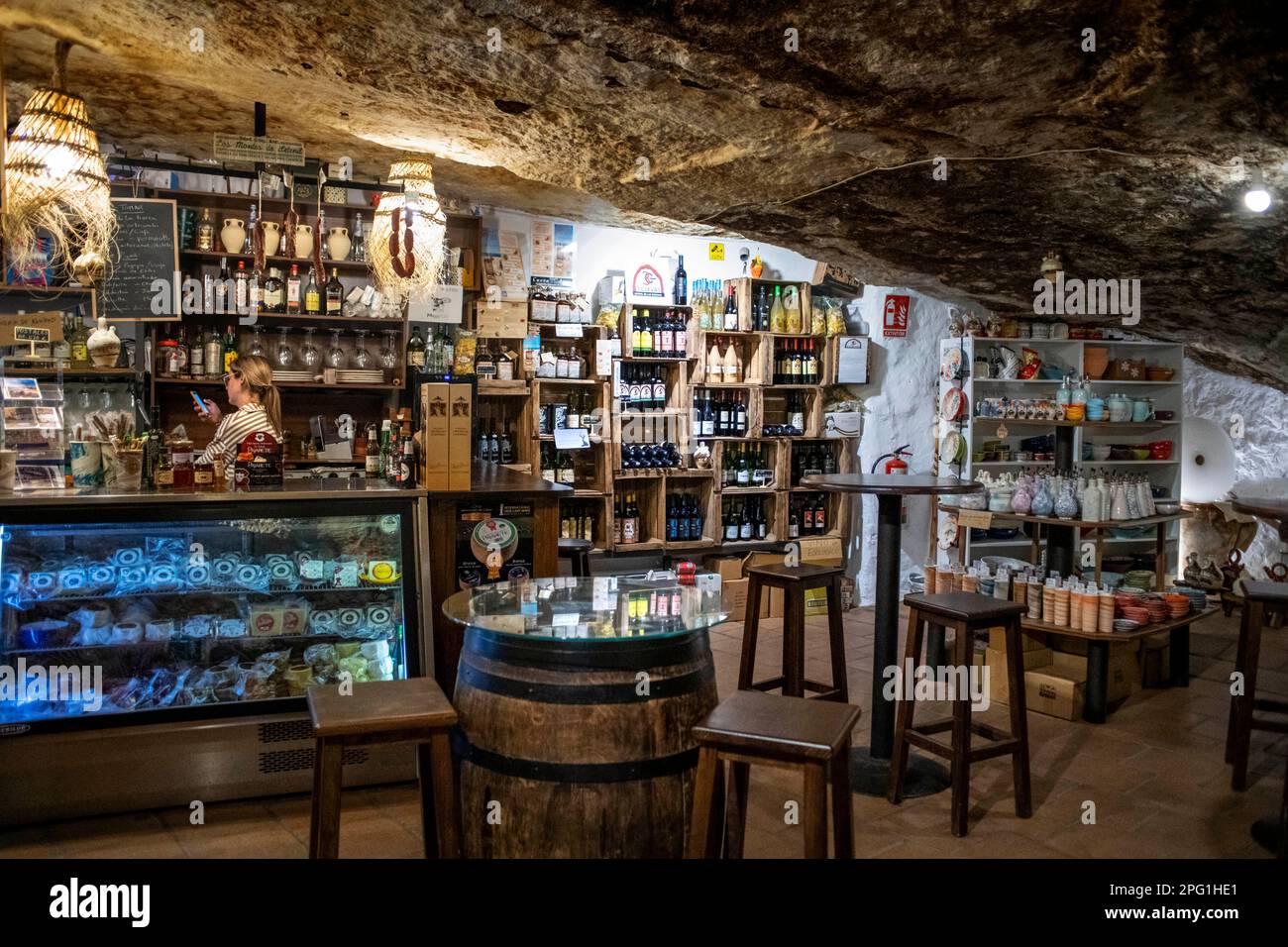 Inside Cueva Alta bar and restaurant in Setenil de las Bodegas, Cadiz, Andalusia Spain.  On Cantería Alta street, there is an establishment called 'Cu Stock Photo