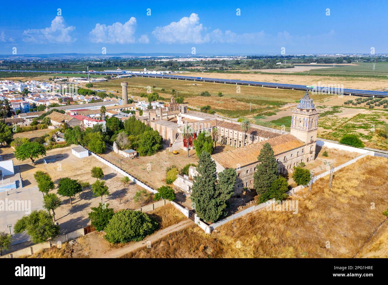 Aerial view of San Isidoro del Campo monastery, Santiponce, Seville Spain.   The Monastery of San Isidoro del Campo, founded in 1301 by Alonso Pérez d Stock Photo