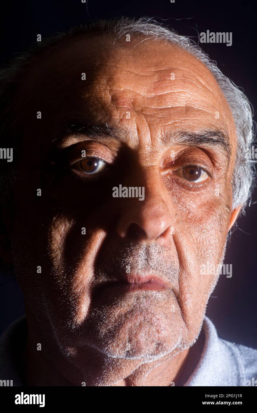 Old man looking at camera Stock Photo