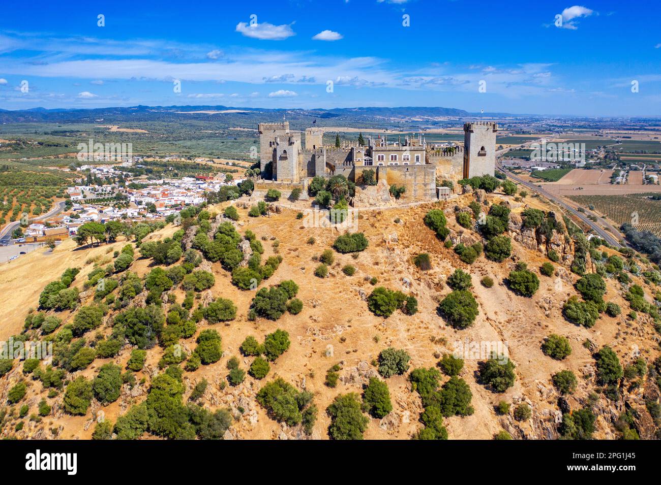 Aerial view of Almodovar del Rio castle in Vega del río Guadalquivir in ...