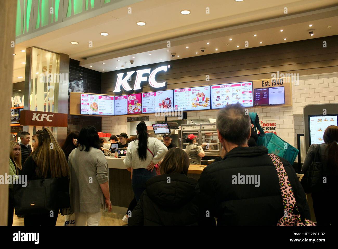 customers at kfc among the restaurants and food outlets inside derbion shopping centre derby england uk Stock Photo