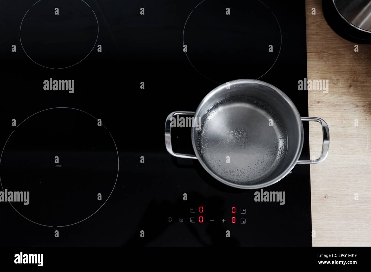 top view of a boiling pot. rapid boiling of water on an induction