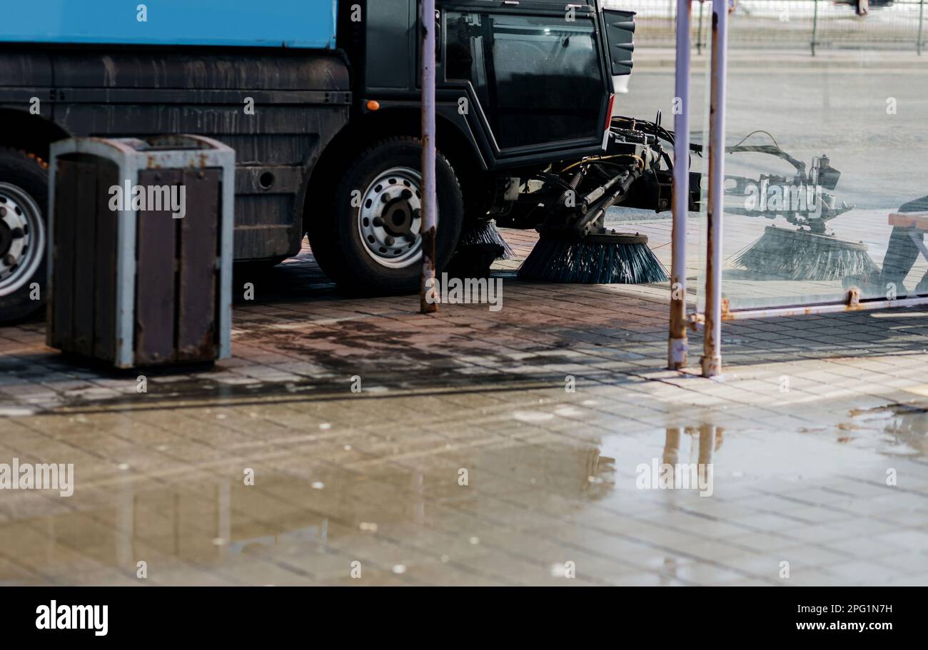 street cleaning machine. urban cleaning car. sweeper cleans the city