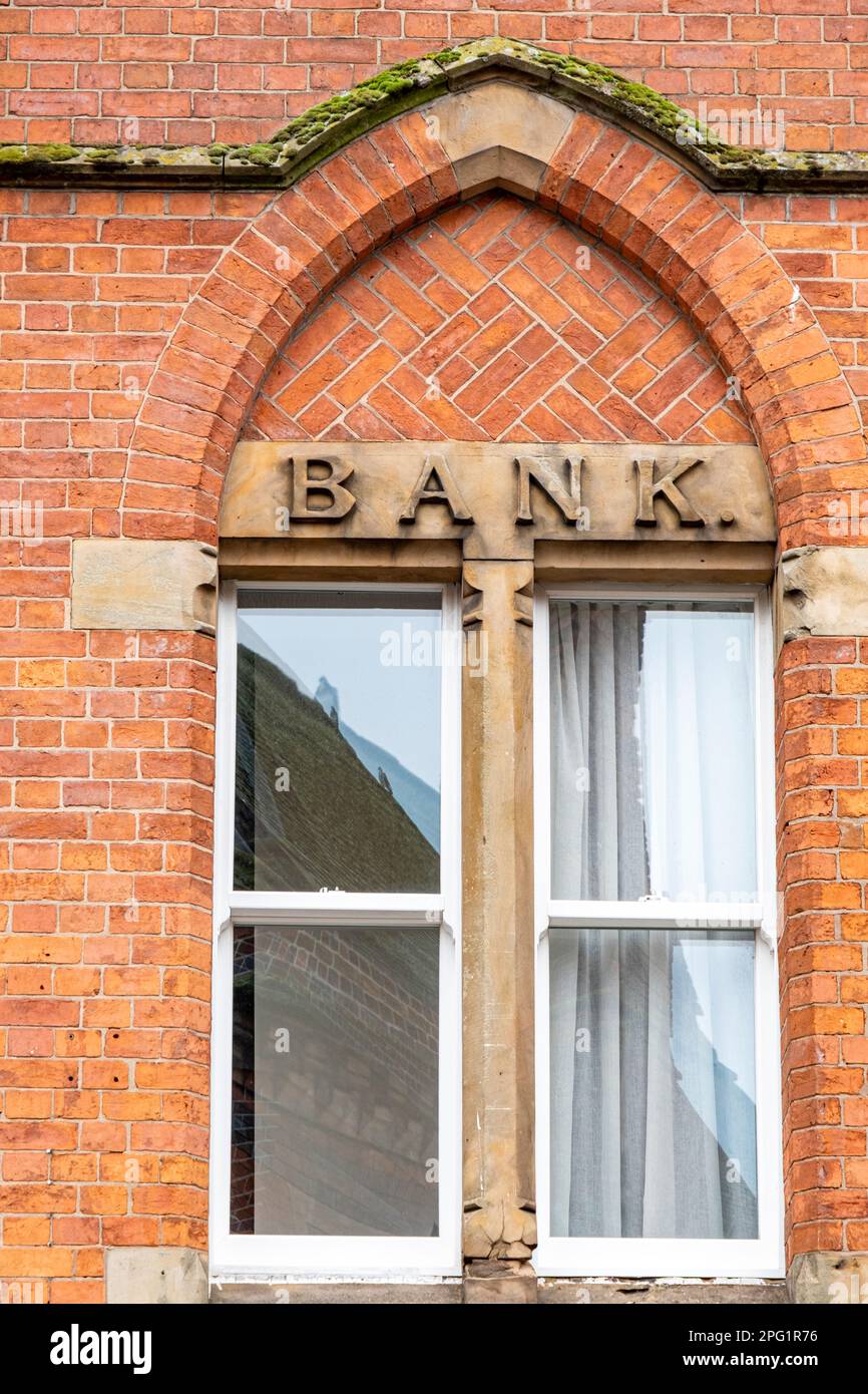 Carved Bank sign on outside of building UK Stock Photo