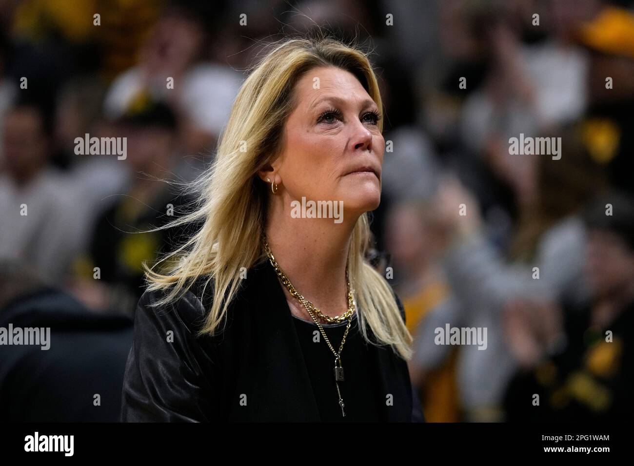 head coach Katie AbrahamsonHenderson walks off the court after
