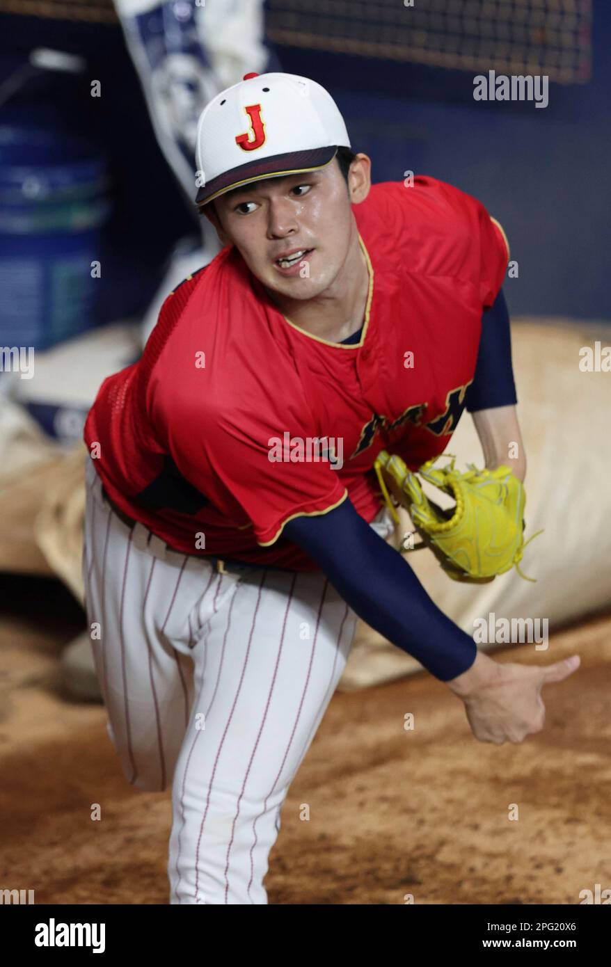 Japan pitcher Roki Sasaki takes part in team practice in Miami