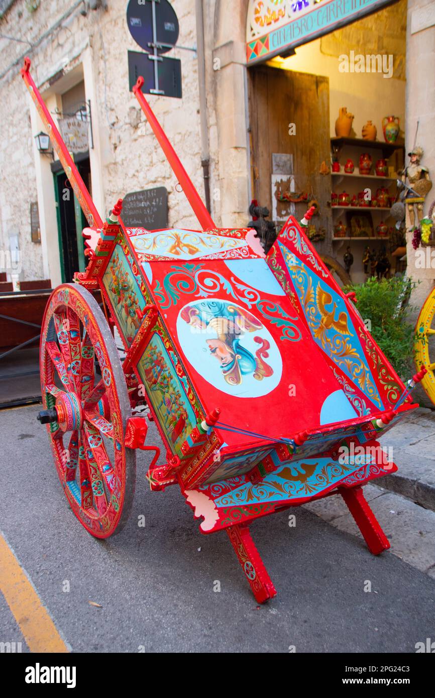 In Acireale, Sicily, a typical paint wheel of a traditional cart named carretto  siciliano Stock Photo - Alamy