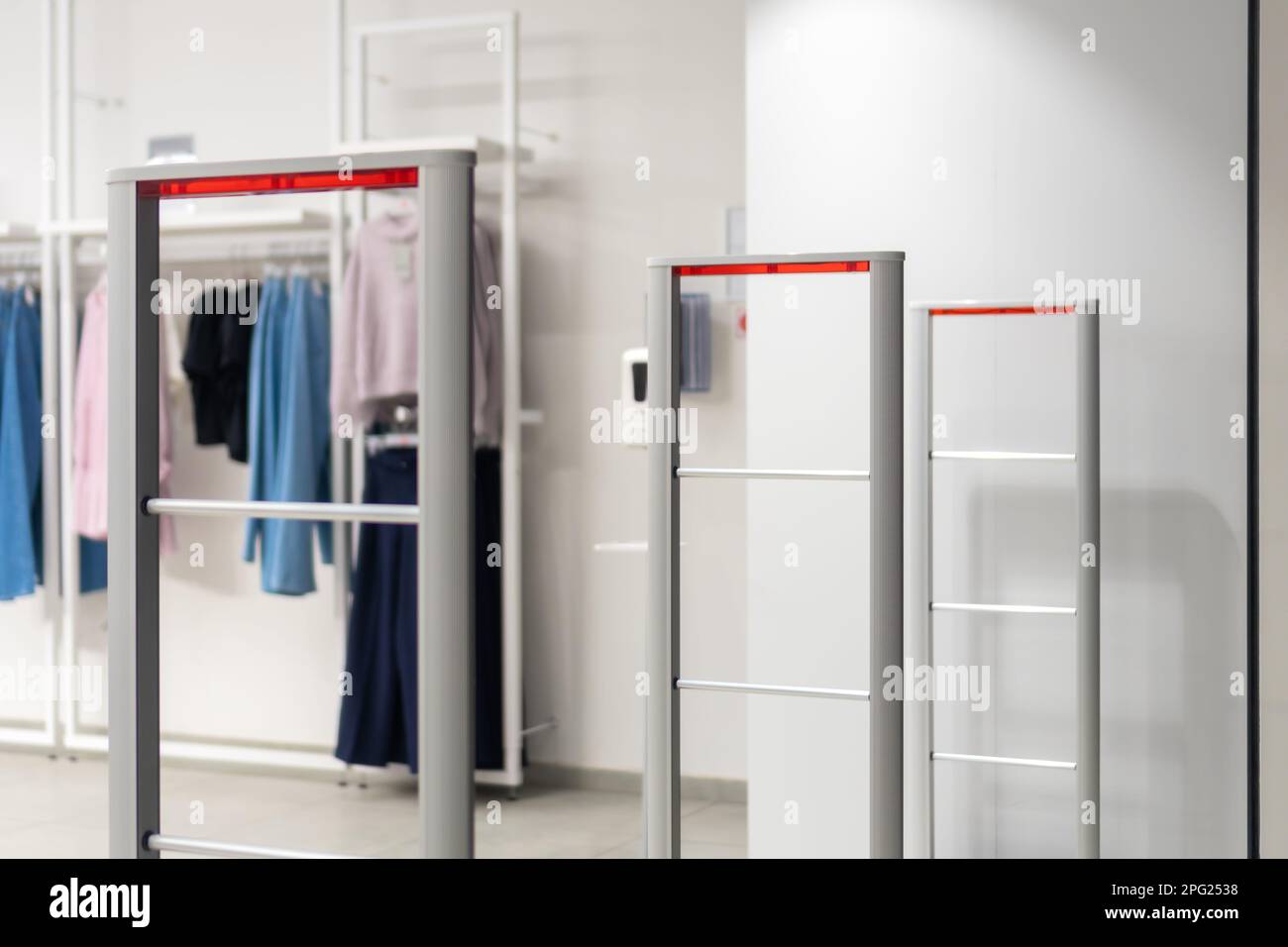 Close up antitheft system in a clothing store. Entrance gate with