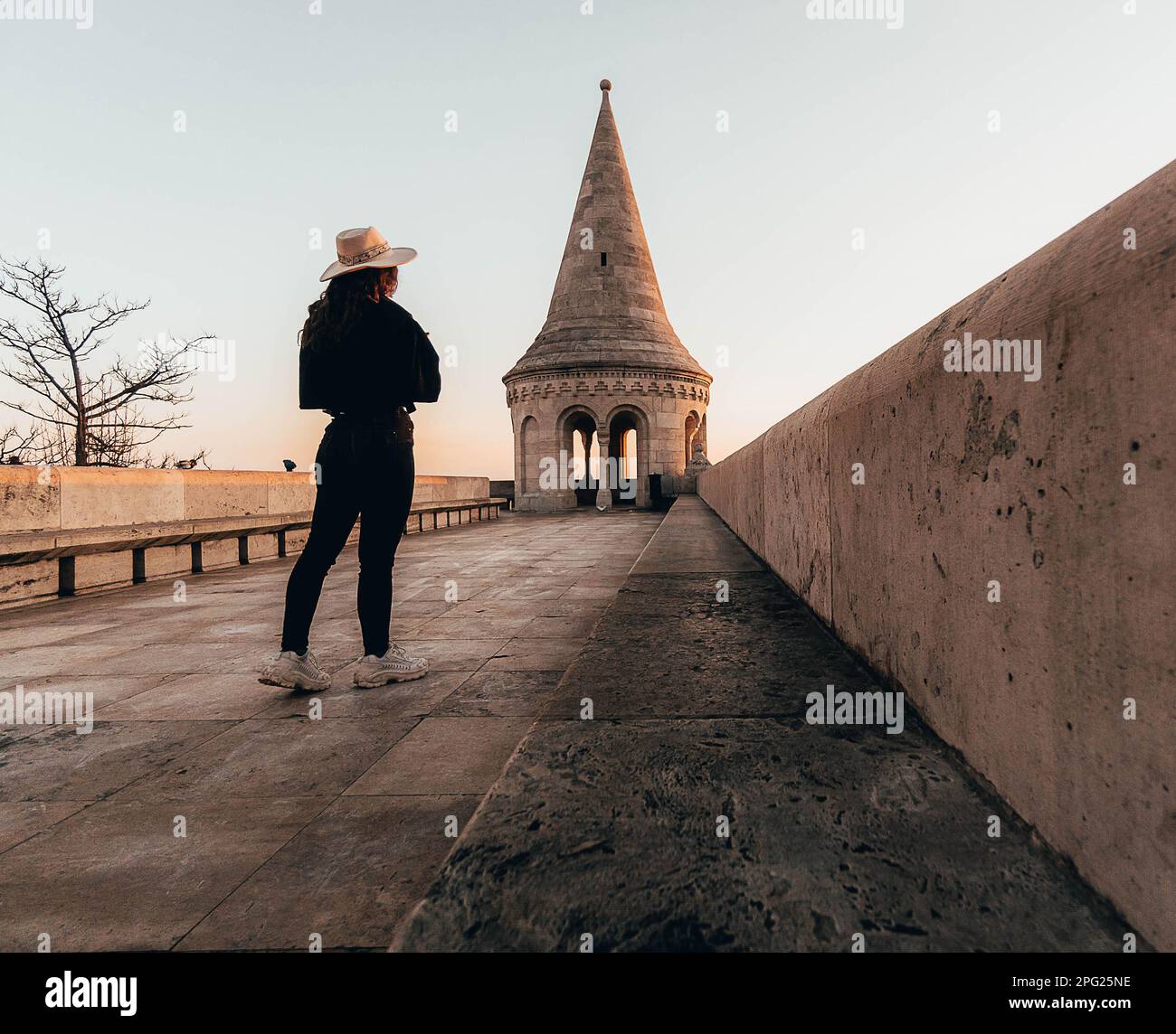girl with hat in corridor of a tower of Fisherman´s bastion Stock Photo