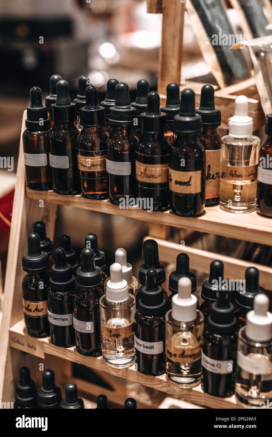 Mockup glass bottles with pipettes. Smell of essential fragrance oil. Perfume tester miniatures