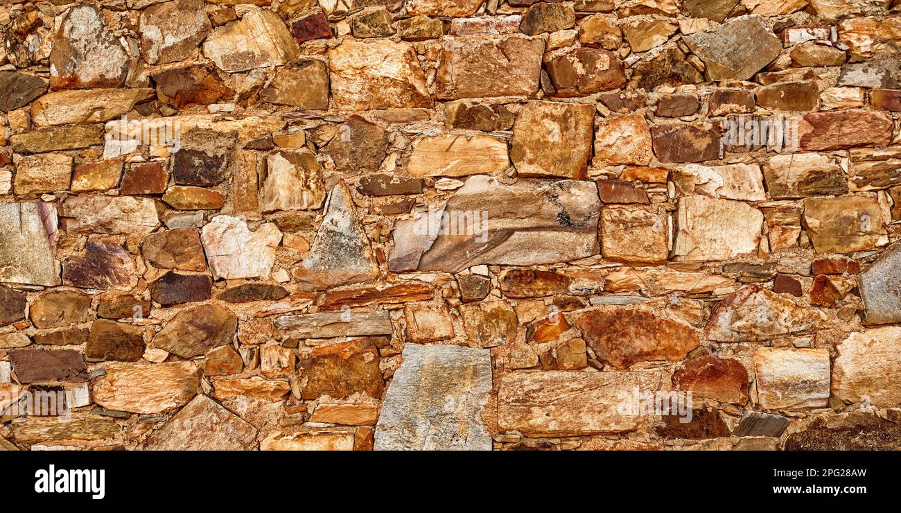 Natural Stone Wall Textured Background Stock Photo