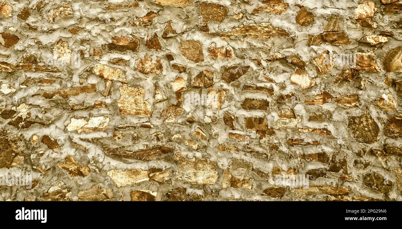 Rough stone wall background hi-res stock photography and images - Alamy