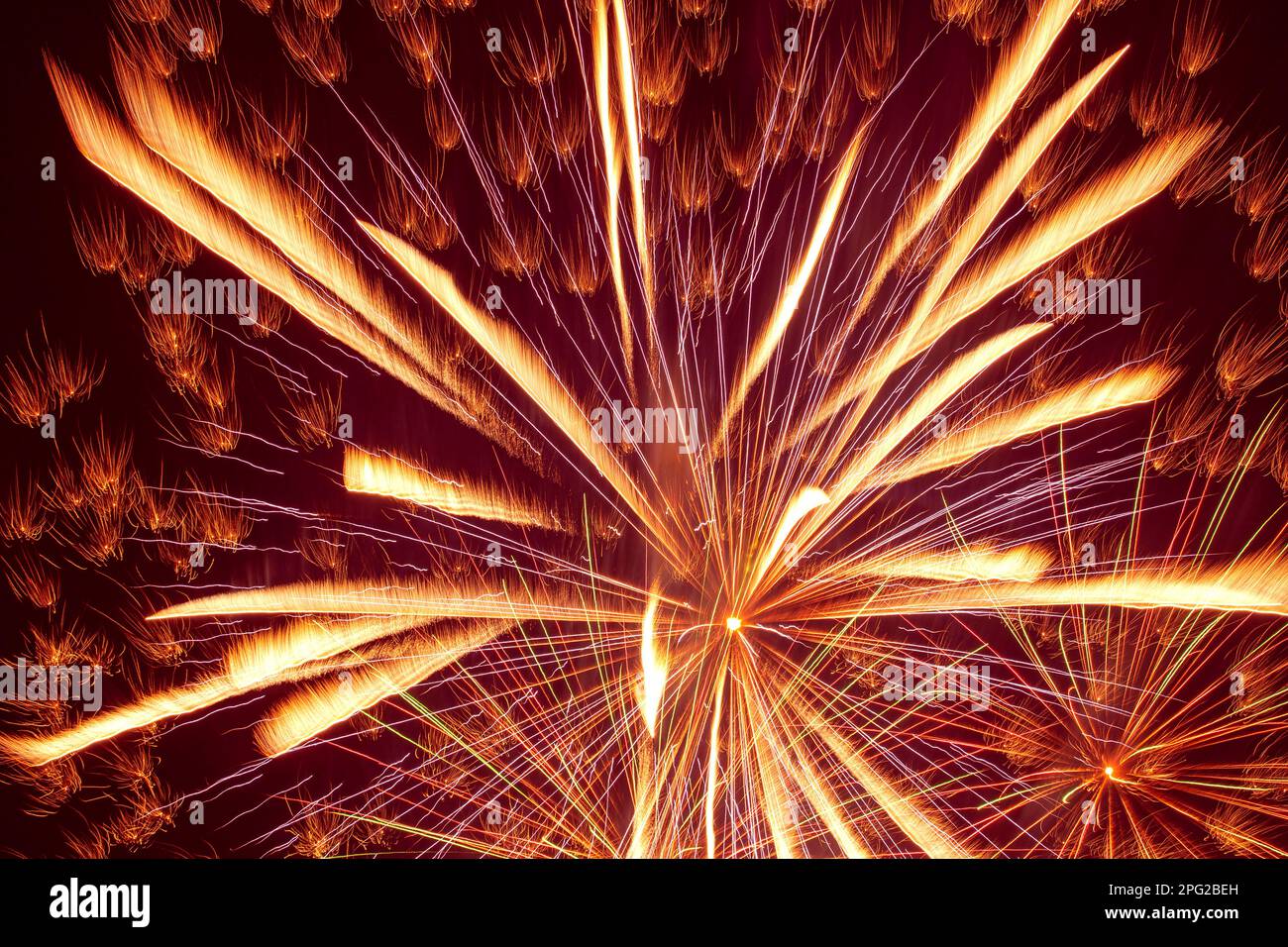 abstract holiday background: bright fireworks against night sky Stock ...