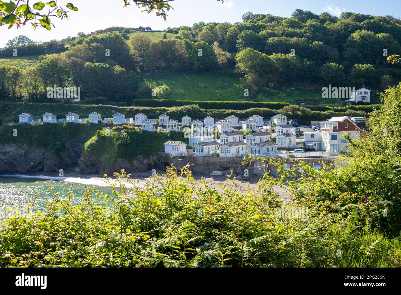 Chalets by the beach at Hele Bay, North Devon, UK Stock