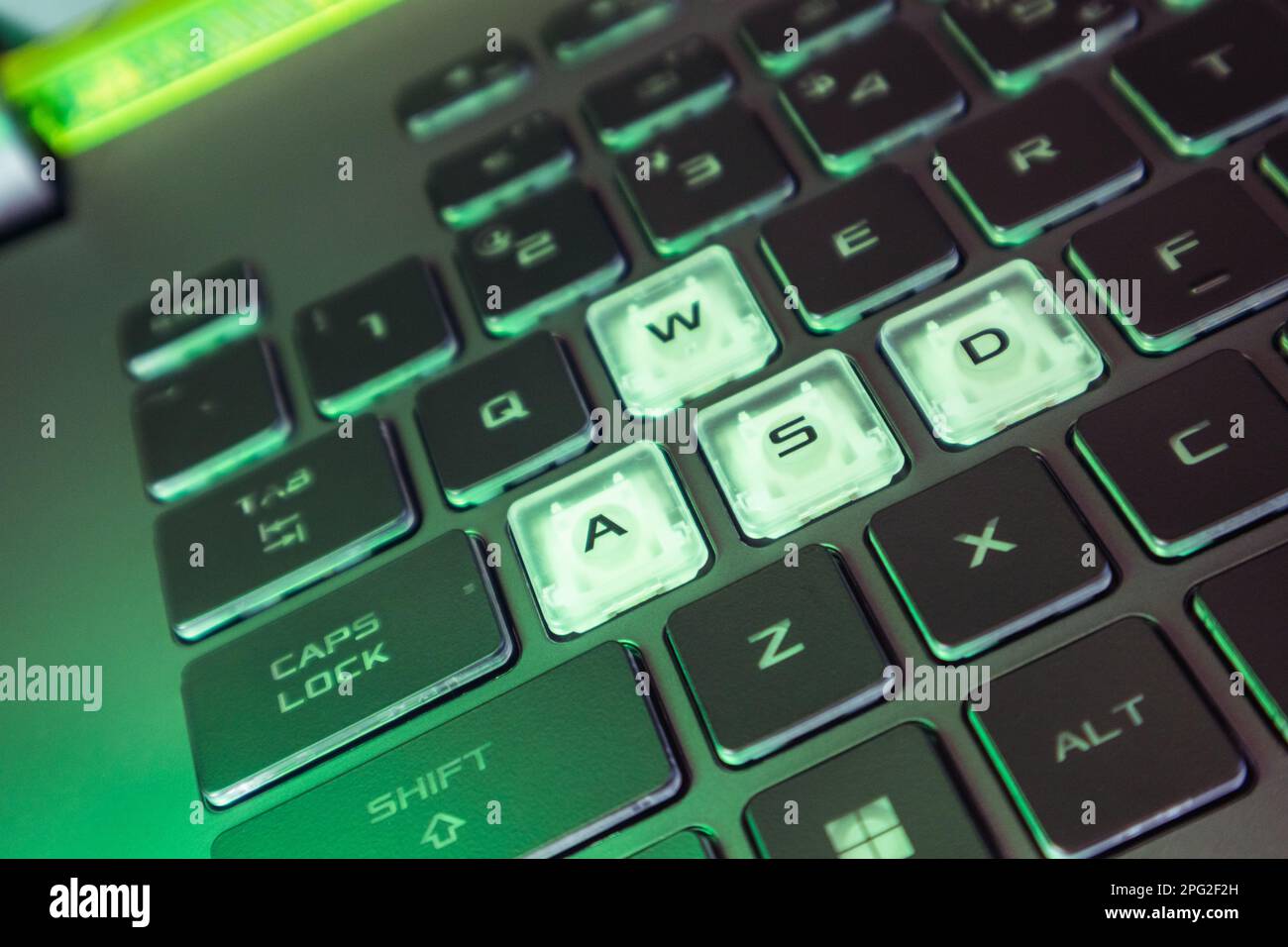 Glowing Letters Keyboard Glowing green neon alphabet letters hi-res stock photography and images ...