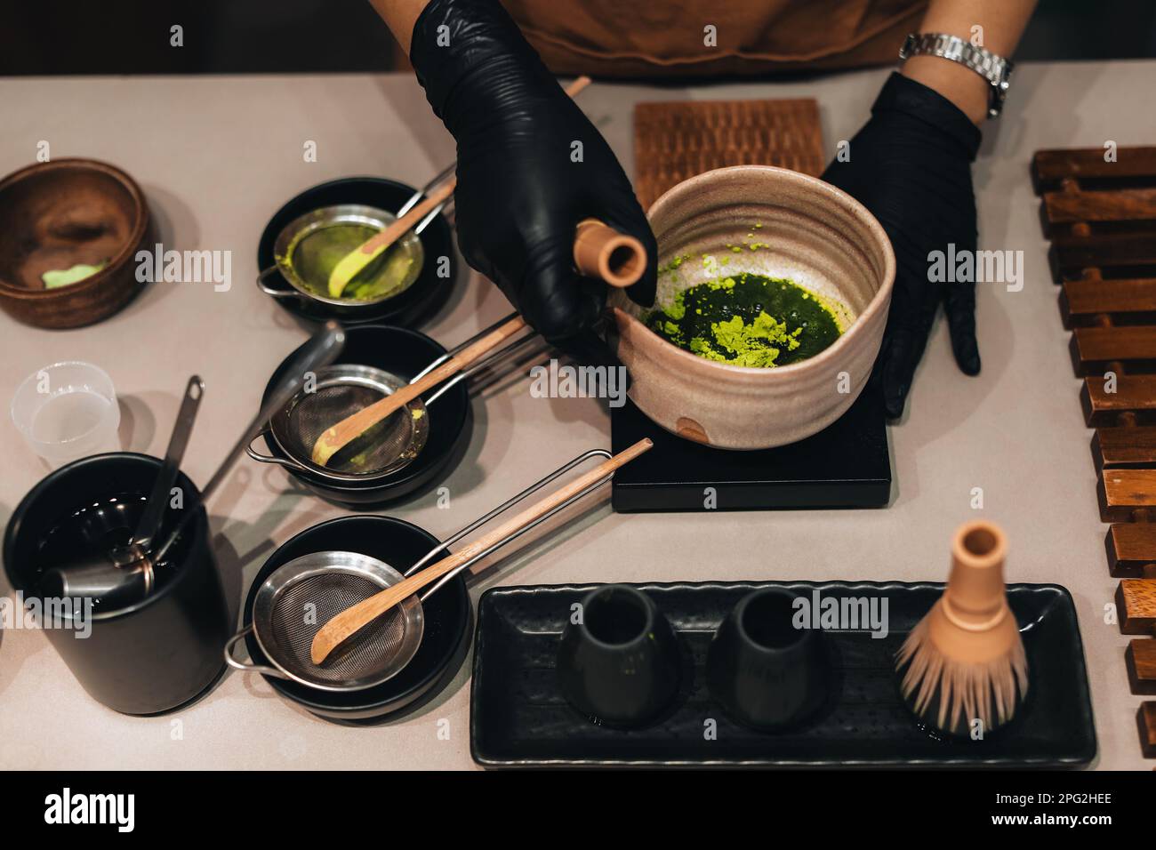 Matcha green tea making process. Still life with organic Japanese