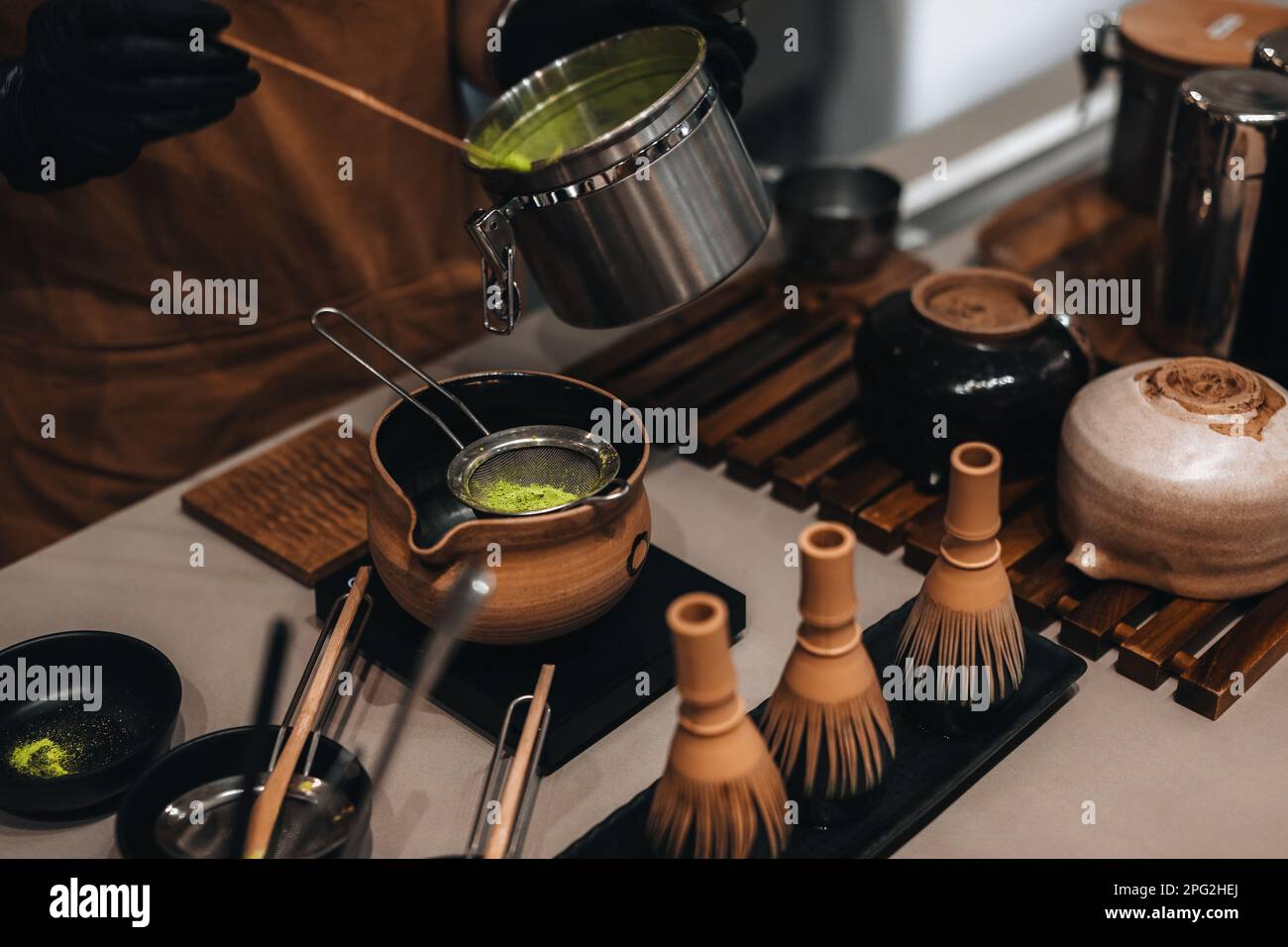 Japanese Matcha green tea making process. Traditional utensils made