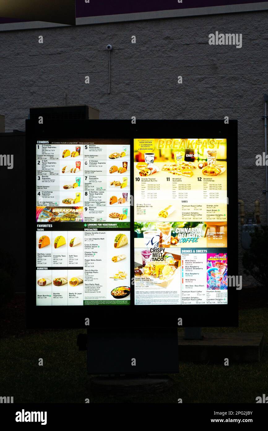 The drive through menu at Taco Bell, a fast food restaurant on Northern Boulevard in Flushing, Queens, New York City Stock Photo