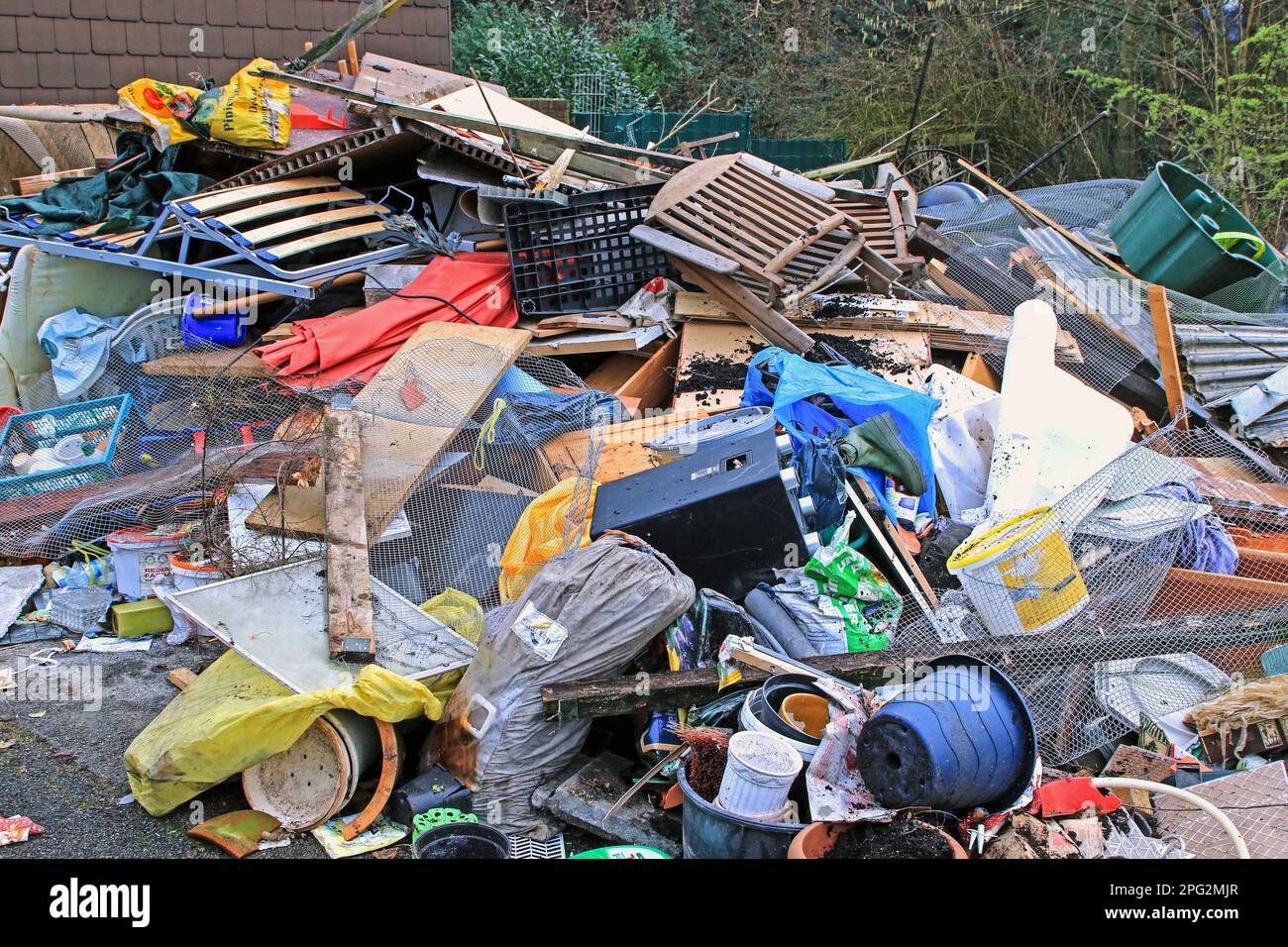 llegally dumped rubbish after a building demolition at the roadside. Germany Stock Photo
