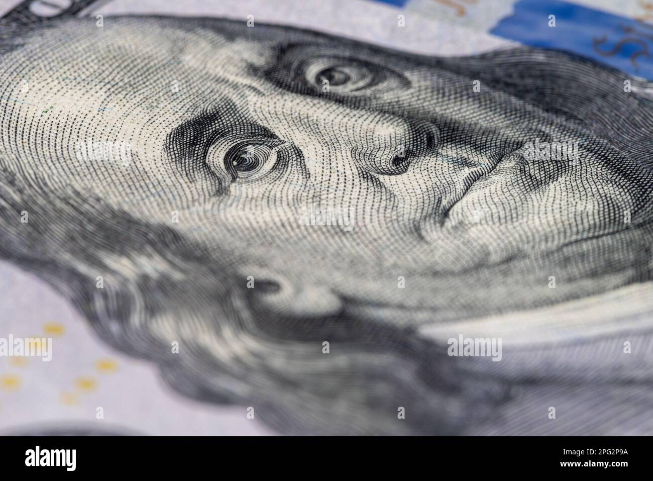 The expression of Benjamin Franklin on the 100 dollar bill Stock Photo