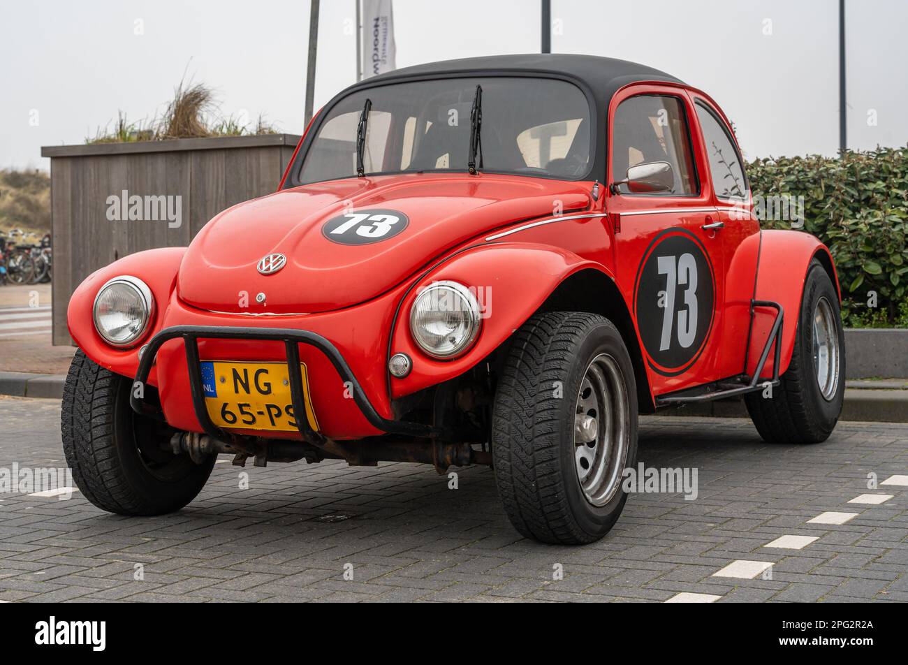 Noordwijk, The Netherlands, 19.03.2023, Custom off-road Volkswagen Beetle 1973 in red color Stock Photo