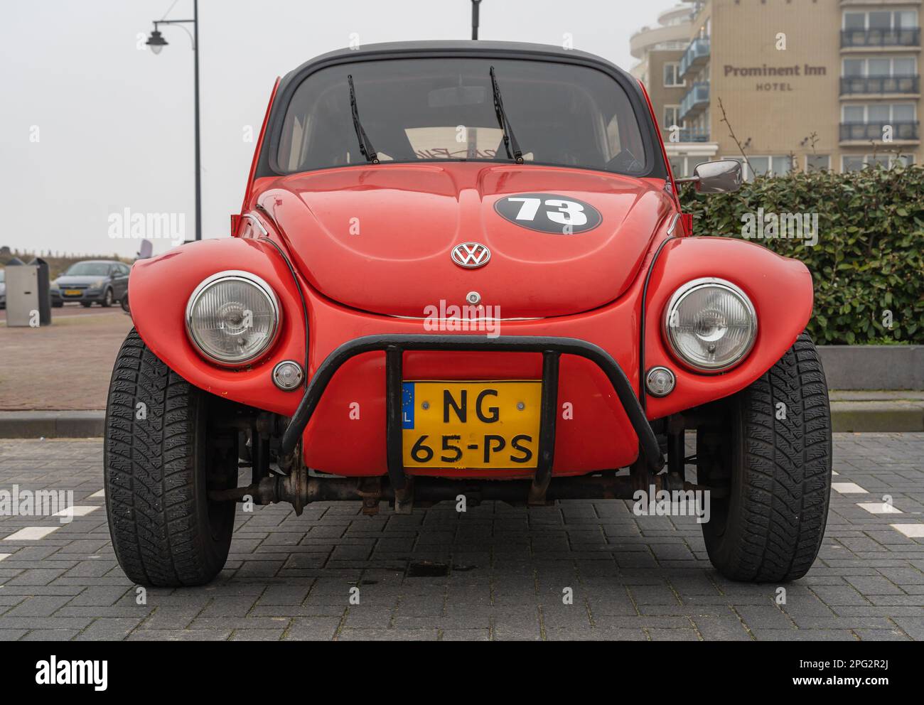 Noordwijk, The Netherlands, 19.03.2023, Front view of custom off-road Volkswagen Beetle 1973 in red color Stock Photo