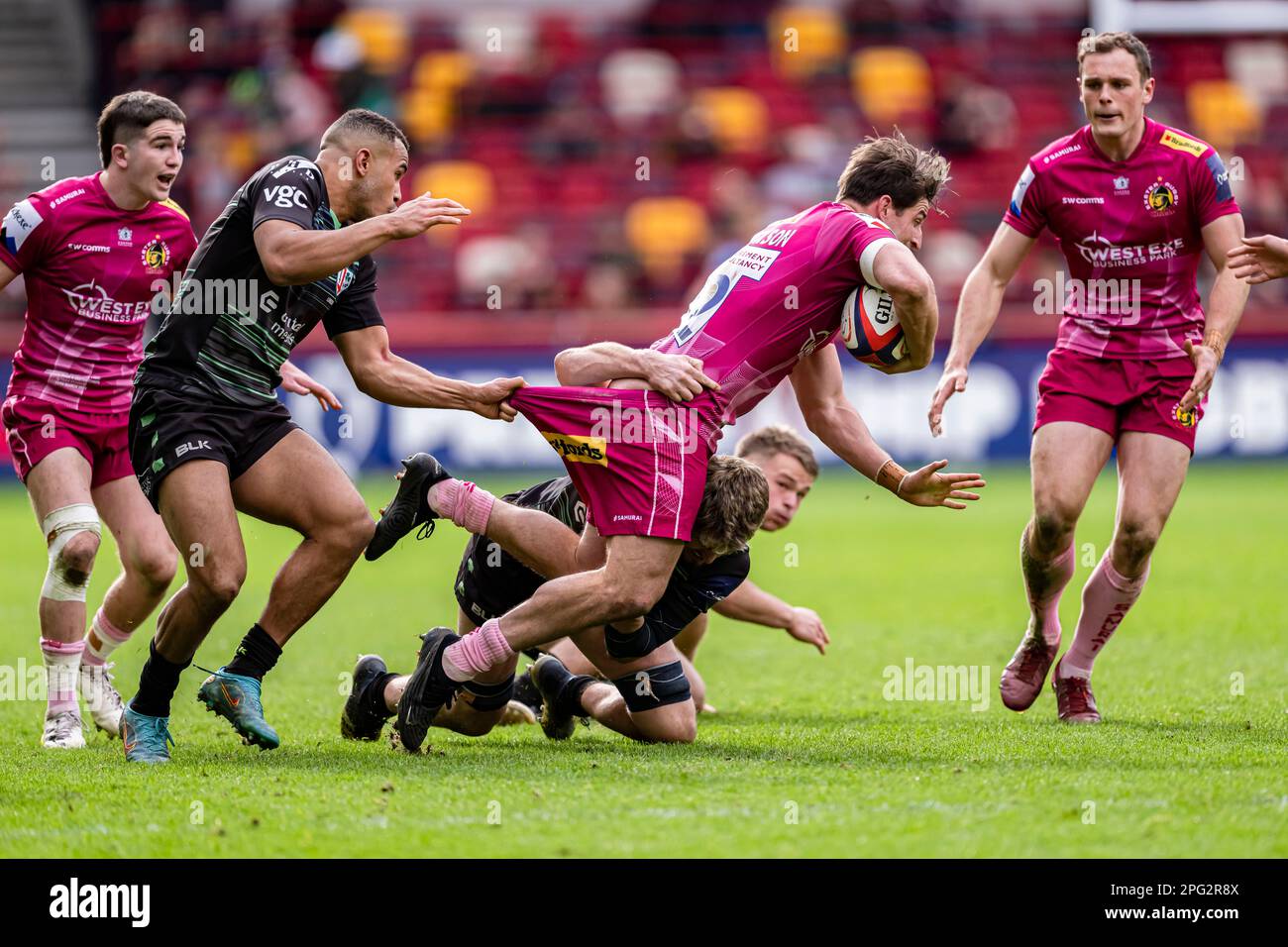 LONDON, UNITED KINGDOM. 19th, Mar 2023. Tom Hendrickson of Exeter Chiefs (left) is tackled during Premiership Rugby Cup Final London Irish vs Exeter Chiefs at Gtech Community Stadium on Sunday, 19 March 2023. LONDON ENGLAND.  Credit: Taka G Wu/Alamy Live News Stock Photo