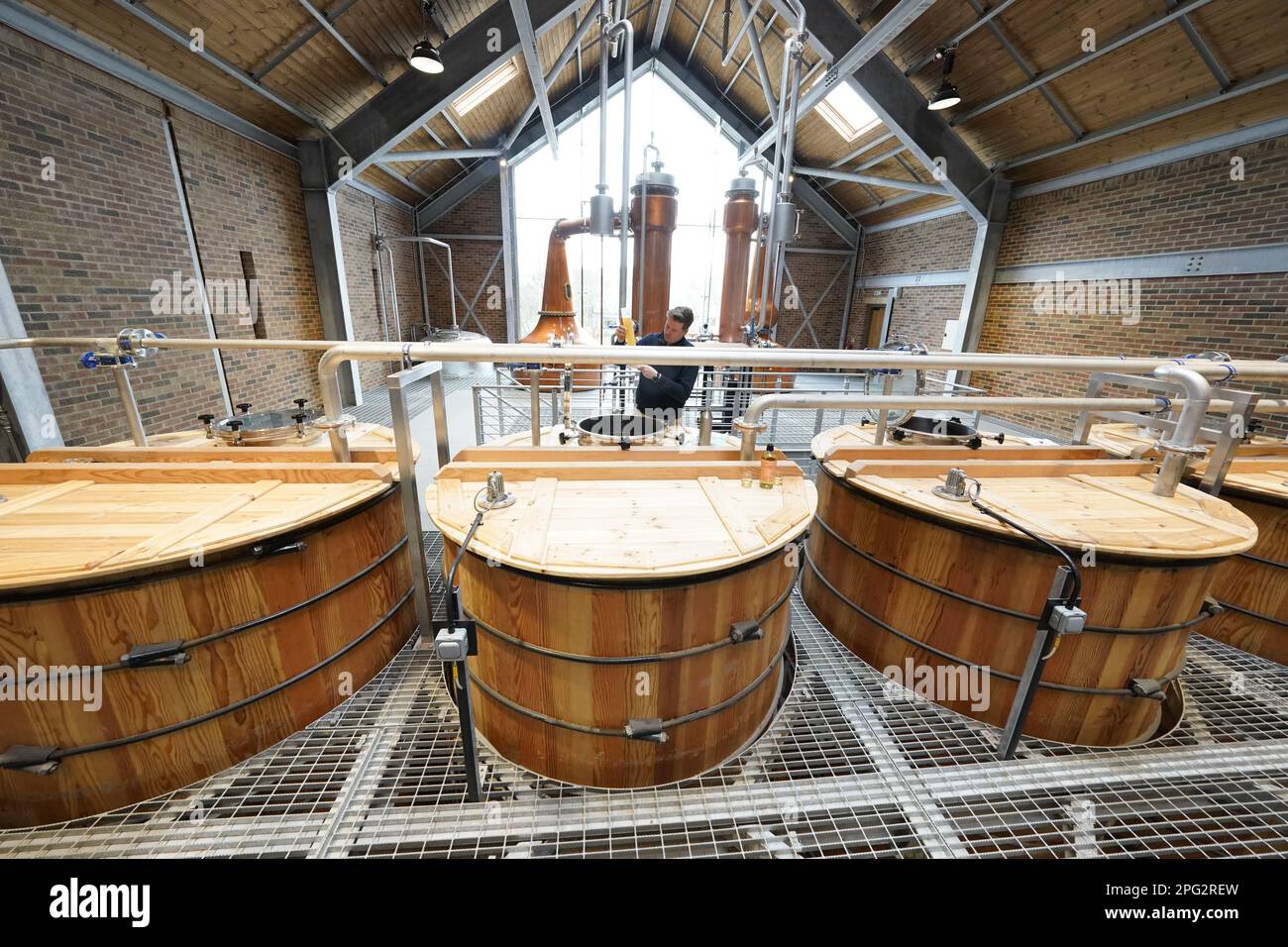 Ben Murphy, 37, director of distilling, checks the apparatus at the new ...