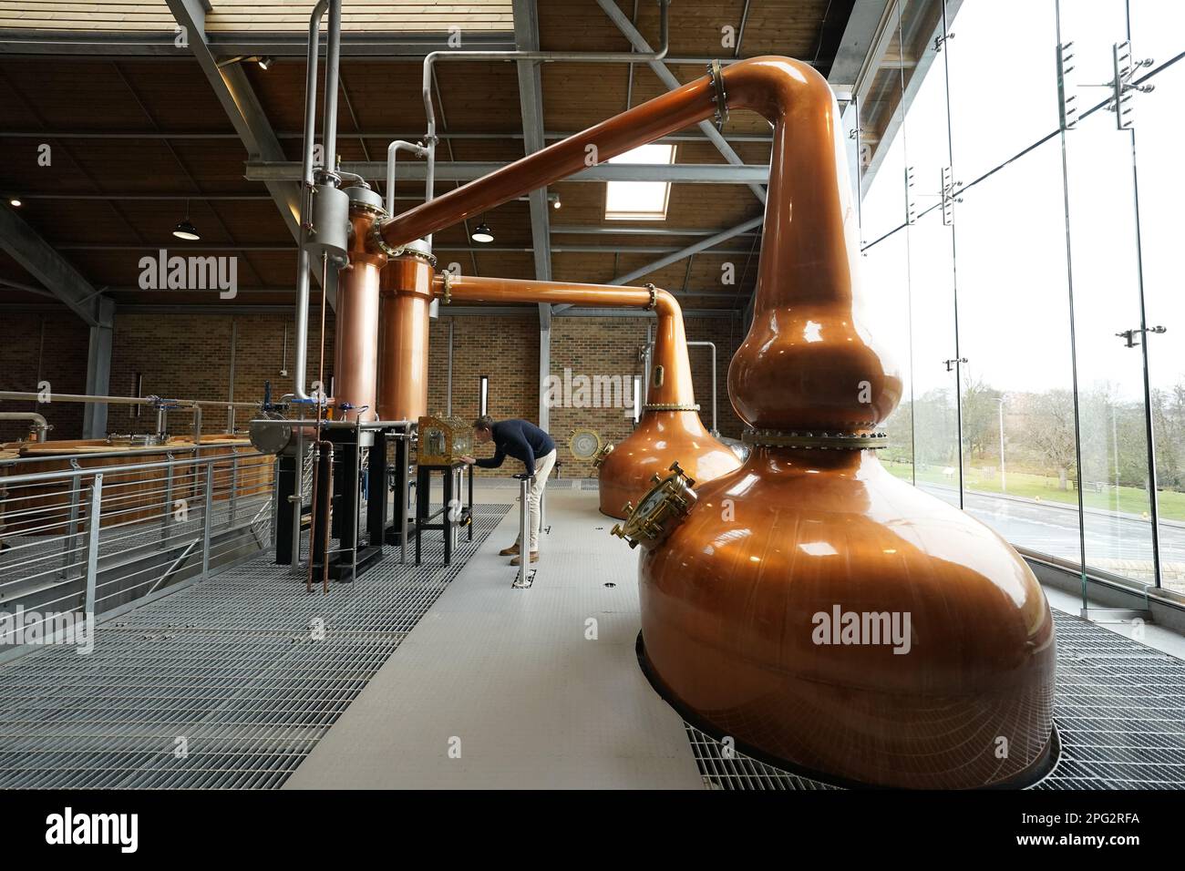 Ben Murphy, 37, director of distilling, checks the apparatus at the new ...