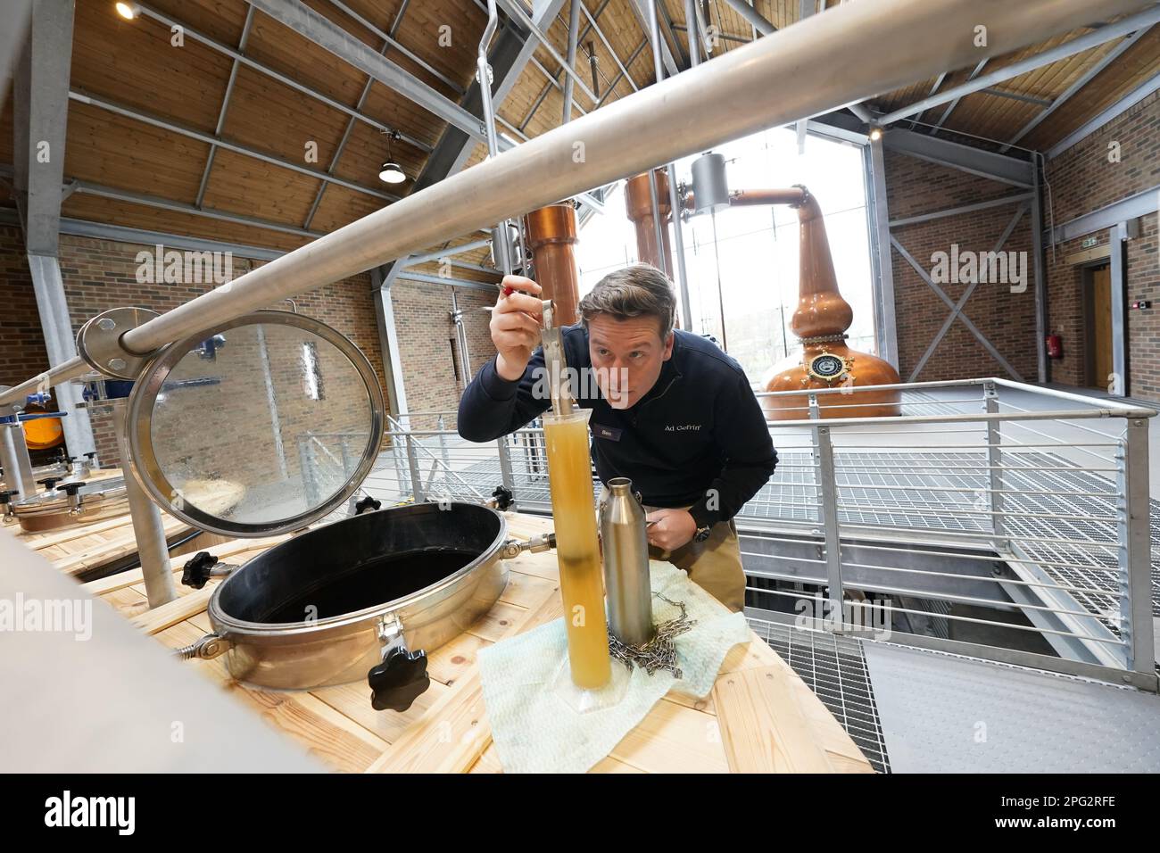 Ben Murphy, 37, director of distilling, checks the apparatus at the new ...
