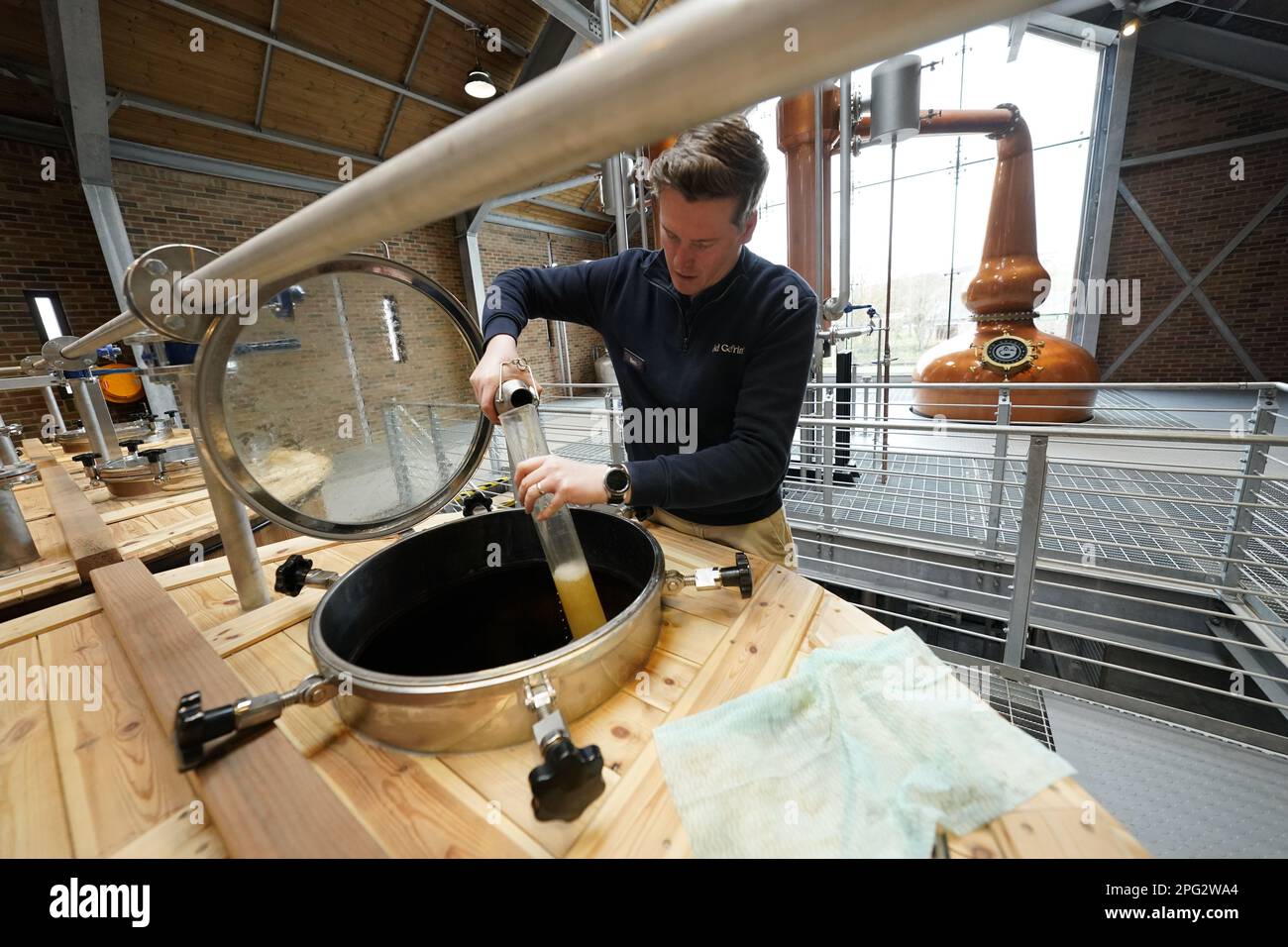 Ben Murphy, 37, director of distilling, checks the apparatus at the new ...