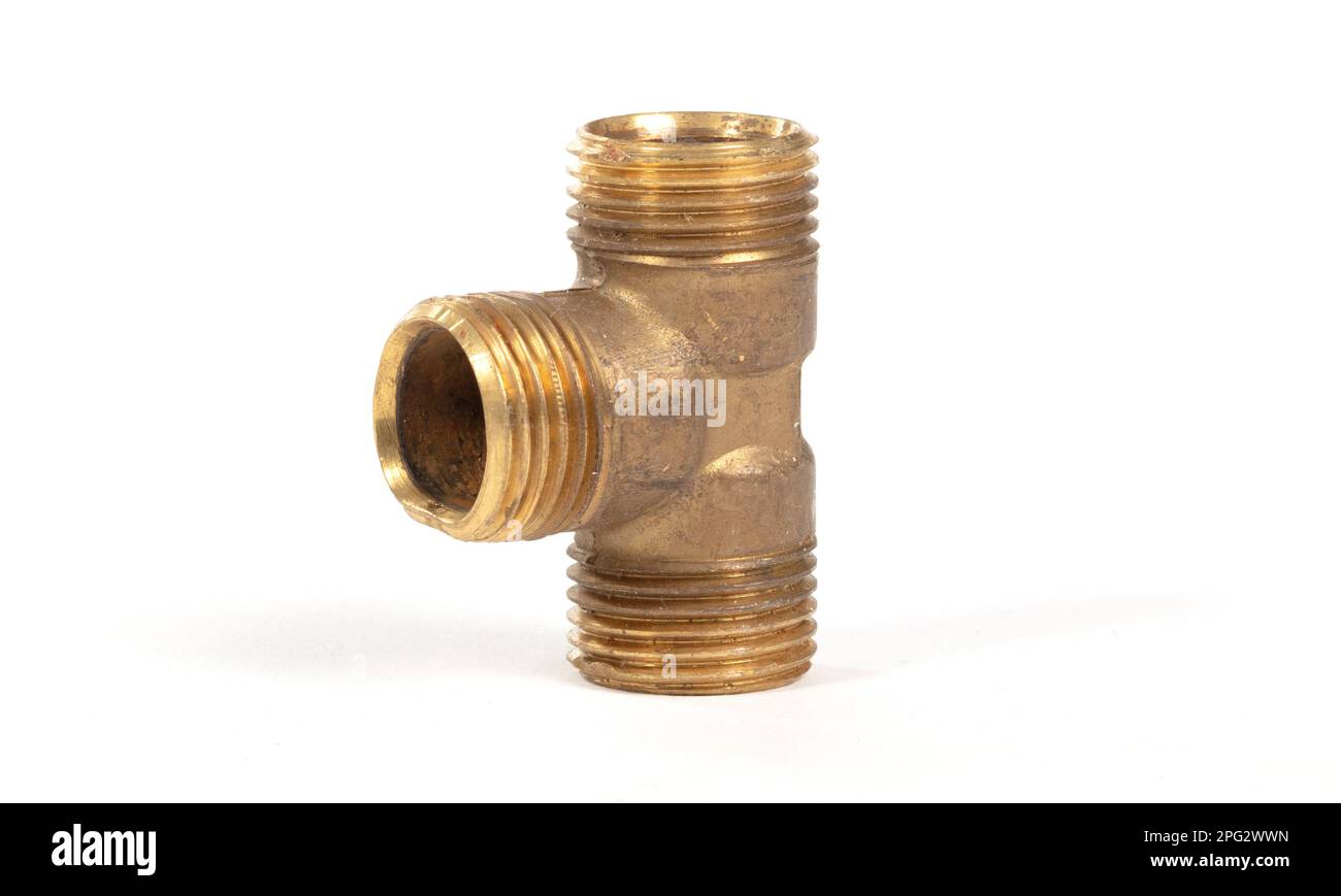 Brass fitting for plumbing pipes, T adapter, isolated on white Stock