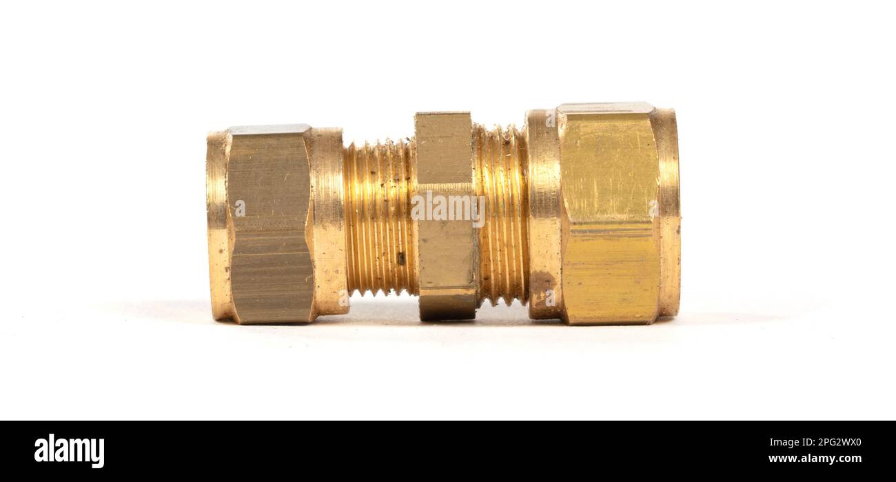 Brass fitting for plumbing pipes, connector for two different sizes, isolated on white Stock
