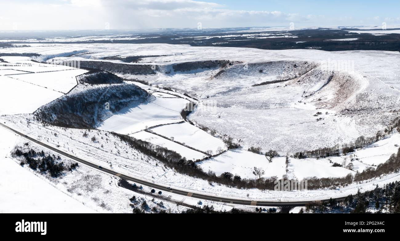 Aerial view of The Hole of Horcum in the North Yorkshire Moors National Park in the Winter months and covered in snow Stock Photo