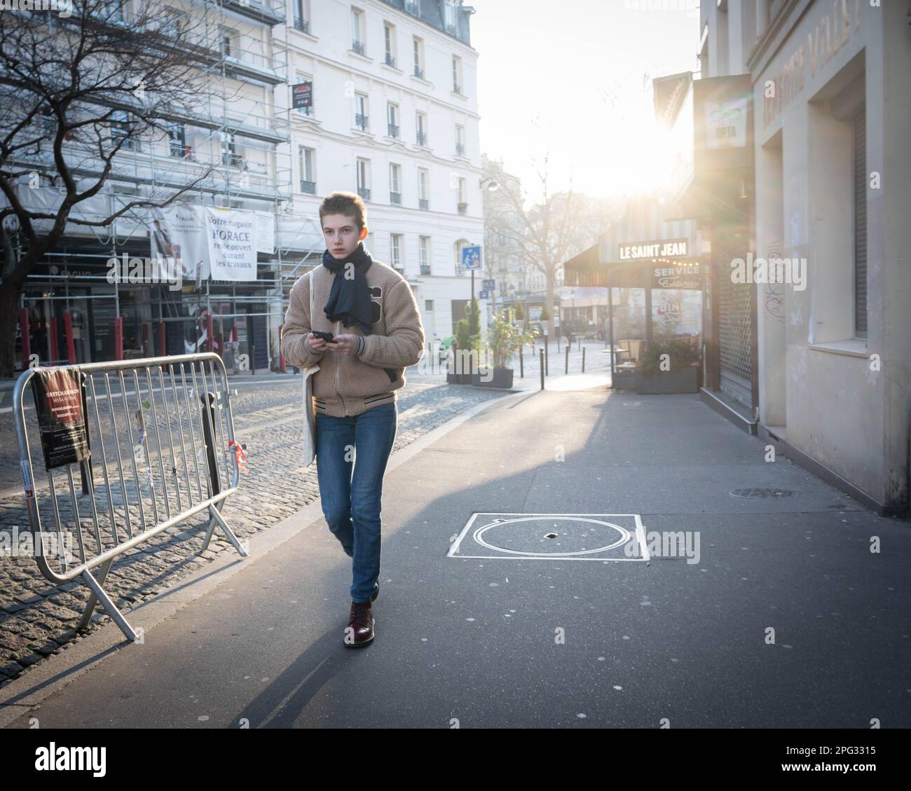 Young man walking in Montmartre, in Paris in Spring Stock Photo