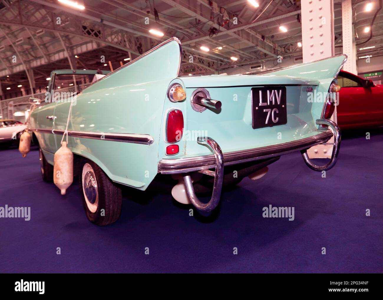 Three-quarters rear view of a Green, 1965, Amphicar,  part of the 2023 London Classic Car Auction at Olympia, London Stock Photo