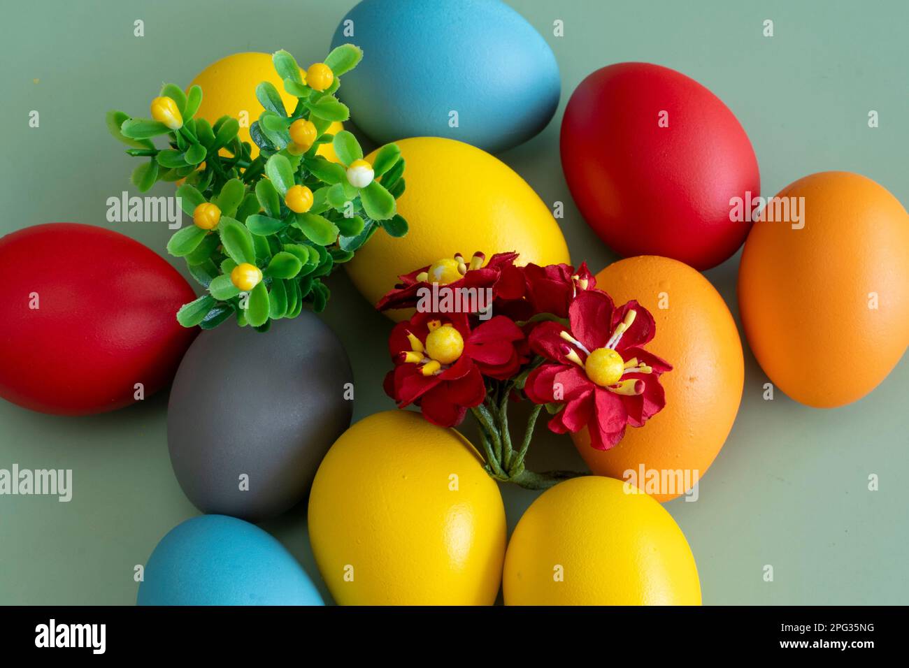 colorful eggs symbolize easter. Easter minimal concept. Creative Happy Easter, spring layout. Stock Photo