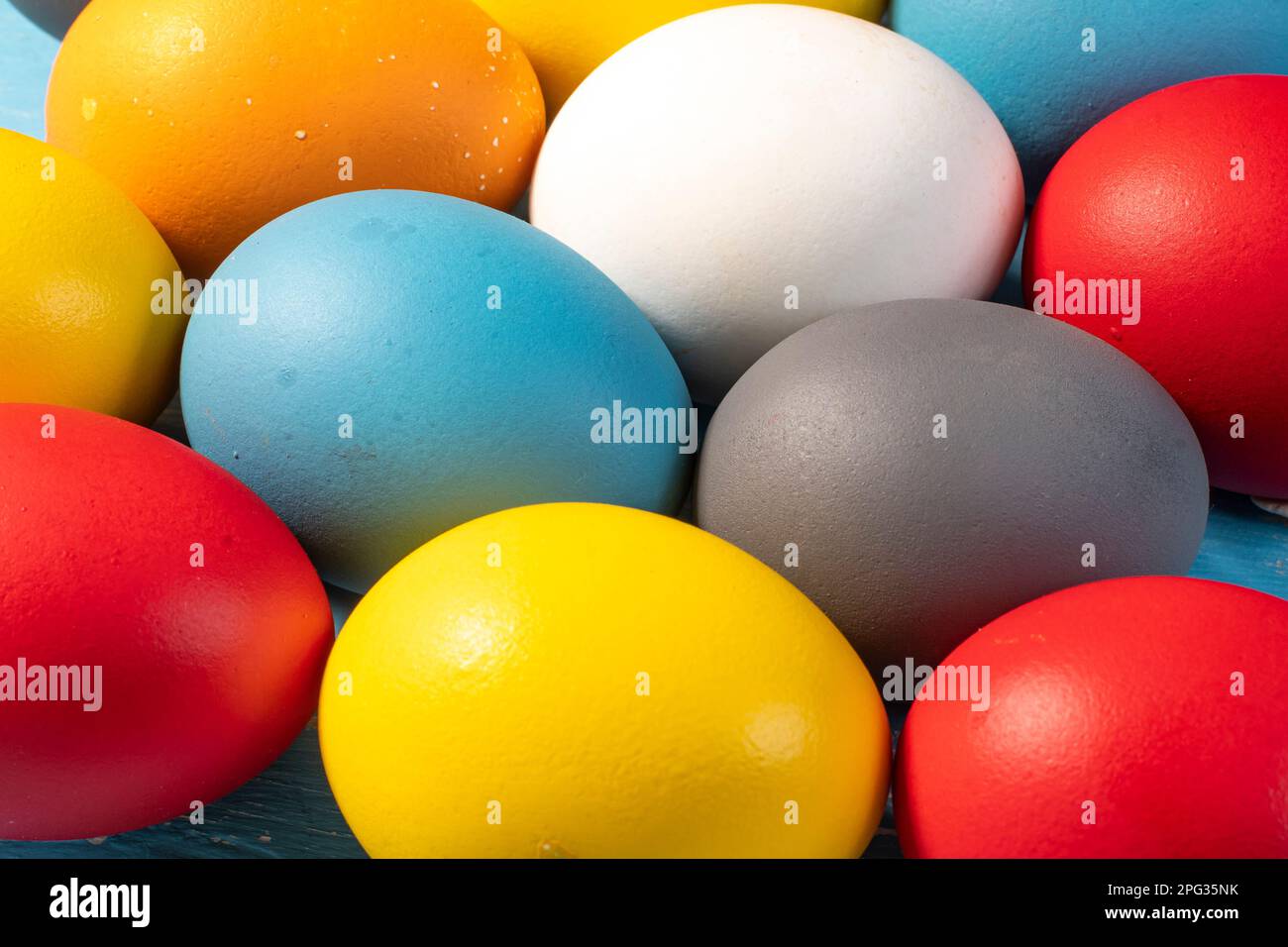 eggs painted in different colors to symbolize the passage of Christian