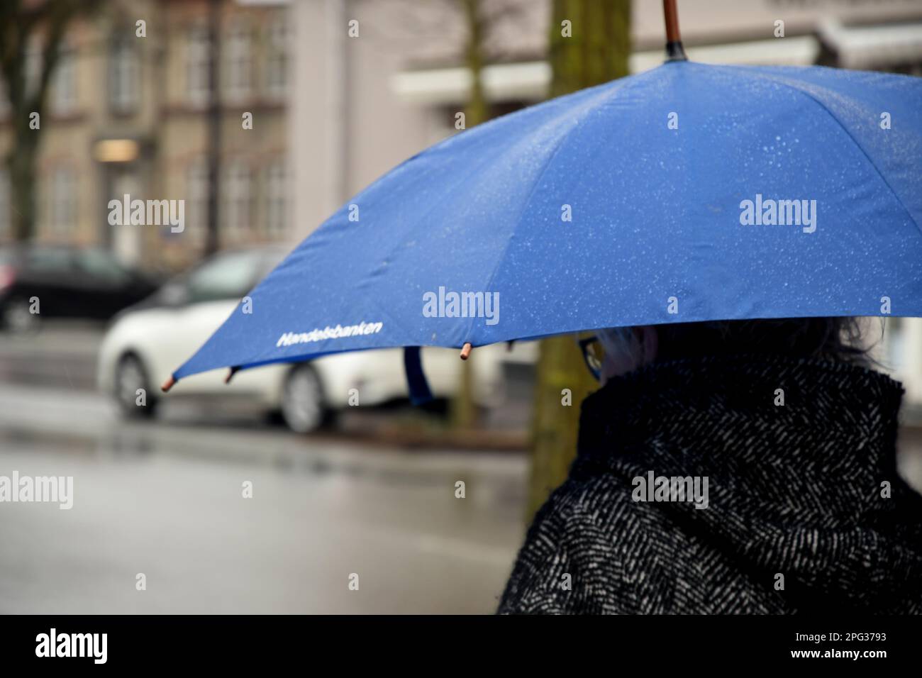 Copenhagen /Denmark/20 March 2023/People use umbrella duering rain fall